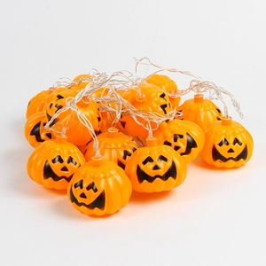 Halloween LED string lights featuring glowing orange jack-o-lantern pumpkins for party decor