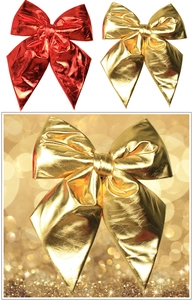 Close-up of metallic red and gold Christmas bows with glossy finish and 3D design