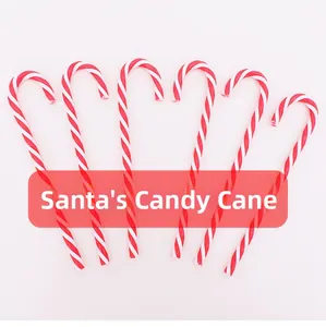 Detailed overhead view of six red and white spiral Christmas candy canes on white background