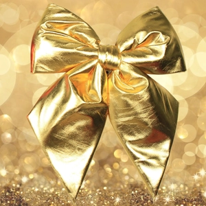 Metallic gold Christmas bow decoration with shiny finish on bokeh light background