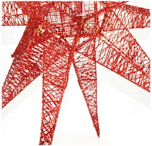 Close-up of red Christmas star decoration featuring glittery hollow mesh texture
