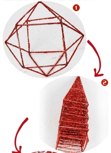 Detailed view showing the folding mechanism of the red glitter star hanging decoration