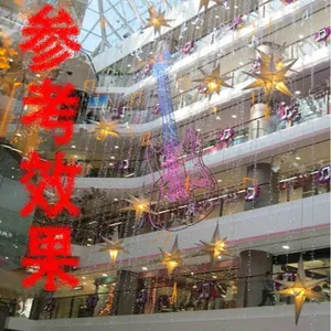 Close-up of LED purple guitar and star hanging lights for shopping mall holiday decoration