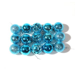 Set of 15 sky blue Christmas ornaments with glitter snowflakes and geometric textures