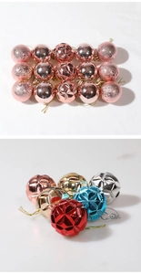 Detailed view of assorted Christmas ball ornaments in rose gold and multi-color textures