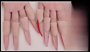 Detail of eco-friendly plastic Halloween finger claws with long red nails for party