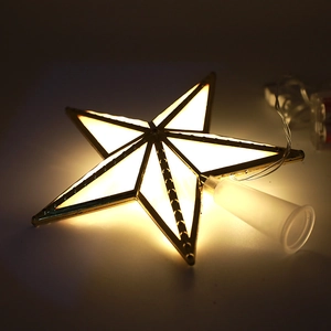 Golden Christmas tree topper star with warm LED lights and hollow metal frame decor