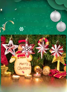 Detail of red and white Christmas star ornaments with glitter and snowflake patterns