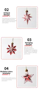 Detail of red and white Christmas star ornament with gold hanger and pearl texture