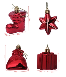 Detail of red electroplated Christmas tree ornaments including star and boot shapes