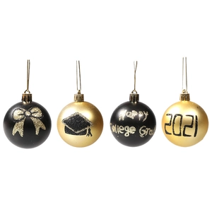 Four-piece graduation themed Christmas balls in gold and black with Class of 2021 motifs