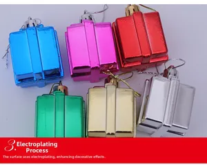 Macro shot of colorful electroplated Christmas gift box ornaments with shiny metallic finish