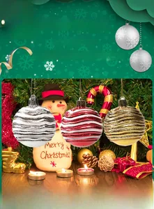 Close-up of wavy textured Christmas balls with glitter finish in red, gold, and silver
