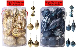 Detail of Christmas ornament set with gold and blue baubles in varied shapes and textures