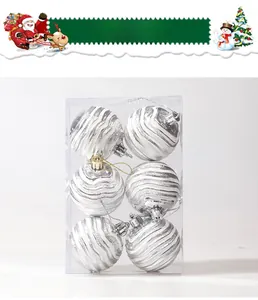 Detail view of 6cm silver water-ripple Christmas balls in a transparent PVC box