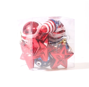 Detail of red white and blue American Independence Day ornaments in clear gift box