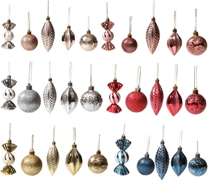 Collection of assorted Christmas ornaments with matte and glitter finishes in various shapes