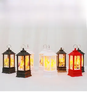 Close-up of Christmas lanterns with warm LED light and festive hand-painted patterns