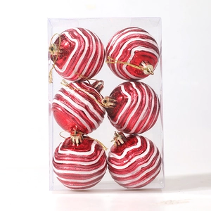 Set of 6 red and white wave pattern Christmas balls with gold strings in a box