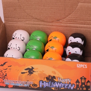 12-piece Halloween wind-up toy set featuring pumpkin, zombie, and vampire characters