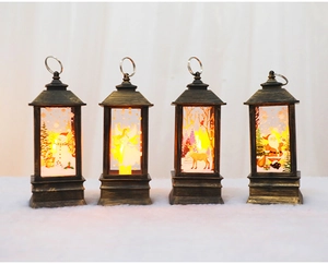 Macro detail of four vintage bronze Christmas lanterns with festive LED illustrations