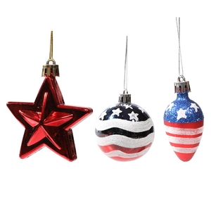 Independence Day patriotic Christmas ornaments with stars and stripes hanging on white background