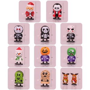 Wind-up toys assortment including Halloween pumpkin, zombie, and Christmas Santa figures