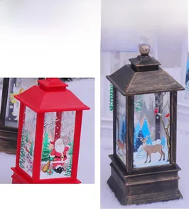 Detail of Christmas lantern with festive Santa and reindeer paintings on snowy background