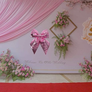 Décoration de mariage en nœud rose métallique avec texture gaufrée pour fêtes