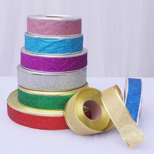 Glitter Christmas ribbons in vibrant colors with metallic edges for holiday decoration