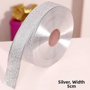 Detail view of 5cm wide silver glitter ribbon roll for Christmas tree decoration