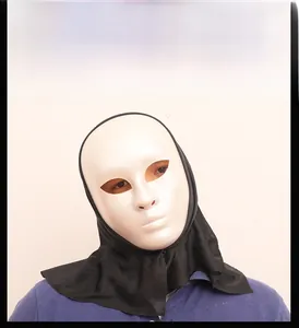 Macro detail of the white minimalist Halloween mask with attached black fabric hood