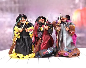 Three-piece Halloween witch dolls featuring pointed hats, brooms and satin wizard robes