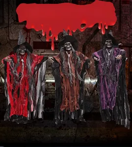 Set of three hanging Halloween skeleton witches in red brown and purple robes
