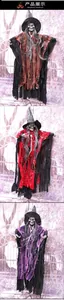 Detailed trio view of Halloween hanging skeleton witches in brown, red, and purple robes