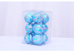 Close-up of nine blue and silver striped Christmas balls in a transparent gift box