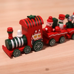 Classic wooden Christmas train decor with festive snowman and reindeer characters in red and green