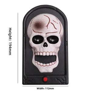 Detailed view of Halloween skull doorbell dimensions 194x112mm with LED glowing eyes
