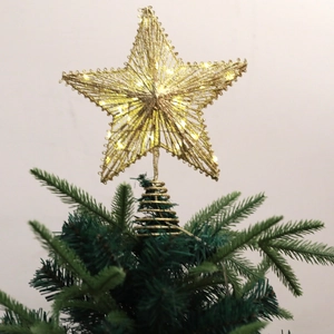 Golden iron wire star Christmas tree topper with warm LED lights and spring base stand