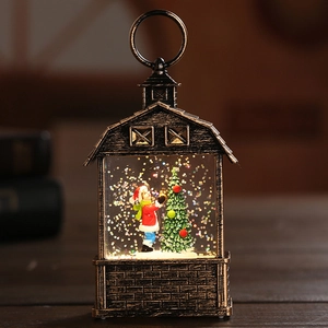 Macro detail of Christmas barn lantern with festive interior scene and glitter