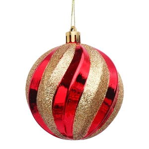 Christmas tree ball decoration with red and gold glitter spiral stripes for festive holiday party