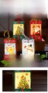 Close-up of Christmas lantern gift boxes featuring festive UV prints and hanging ropes