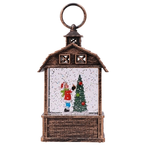 Vintage bronze barn lantern with a Christmas tree scene and glittering snow inside