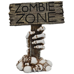 Halloween Zombie Zone skeletal hand holding sign on skull base table decoration