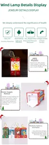 Detail view of ABS Christmas lanterns with Santa and snowman patterns using AAA batteries