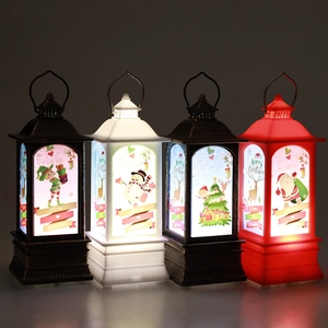 Set de cuatro faroles LED navideños con motivos festivos de Papá Noel y muñecos de nieve