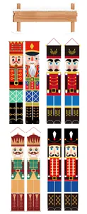 Close-up of colorful nutcracker soldier banners for Christmas porch decoration