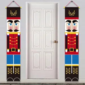 Nutcracker Christmas door banners made of durable Oxford cloth hanging on a white door frame