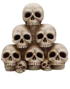 Detail of stacked skulls Halloween decoration with realistic bone texture and antique finish