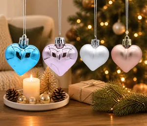 Glossy electroplated heart-shaped ornaments in pastel blue, purple, white, and rose gold